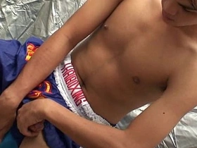 Gay Asian twink Joss masturbates.
