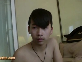 Young Asian man masturbates and cumshots.