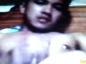 A single Asian man pleasuring himself.