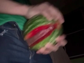 Enjoy a refreshing watermelon-themed handjob with an Asian cutie.