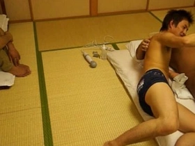 Gay Japanese bottoms getting a handjob