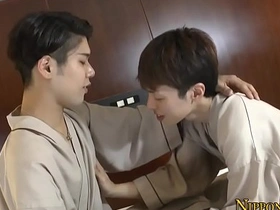 Young gay twink gets oral pleasure from Asian stud