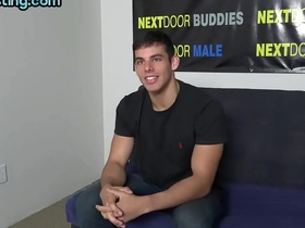 A single, attractive man with a tattoo masturbates during an audition