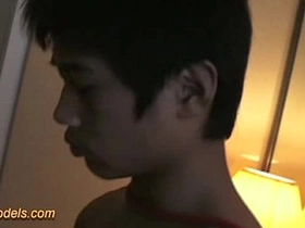 Thai young boy boxer gets bound and enjoys a handjob