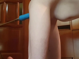 Femboy beauty enjoys solo play with sex machine